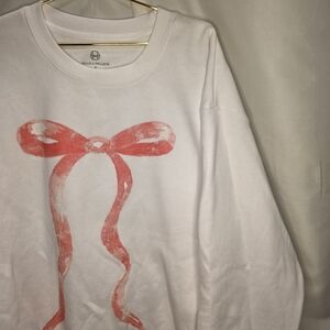 White Sweatshirt with Pink Bow Design